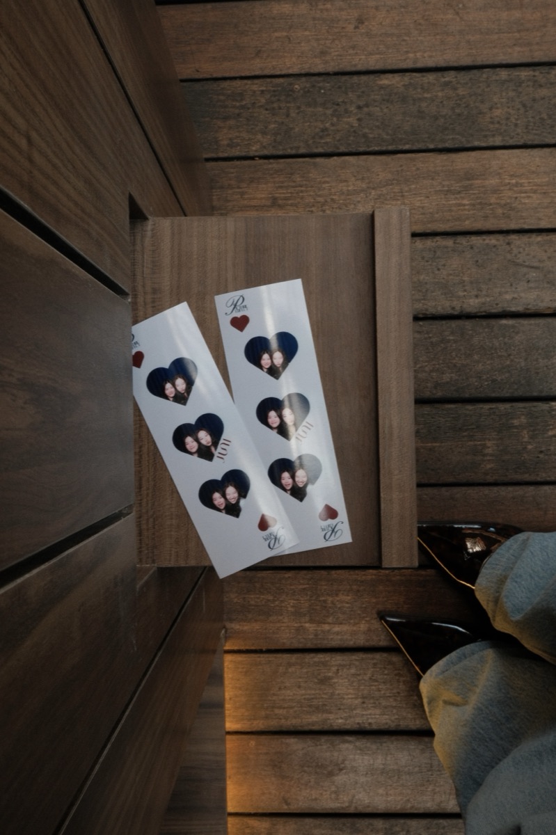 Freshly printed guest photo strips at the Juni Bar & Lounge booth
